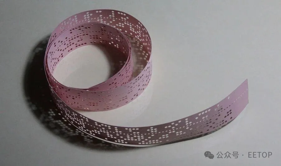 A new perforated tape reader design has been demonstrated